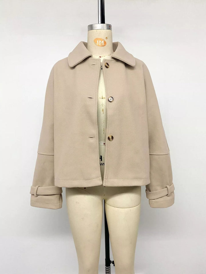 Cropped collared button-up jacket with cuff tabs