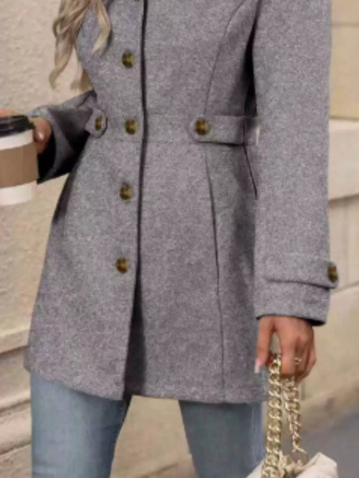 Notched lapel button-up coat with waist tabs