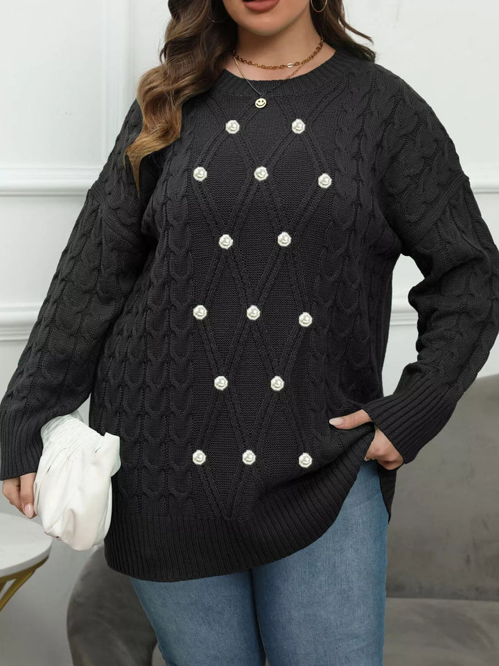Cable knit dropped shoulder sweater with floral buttons