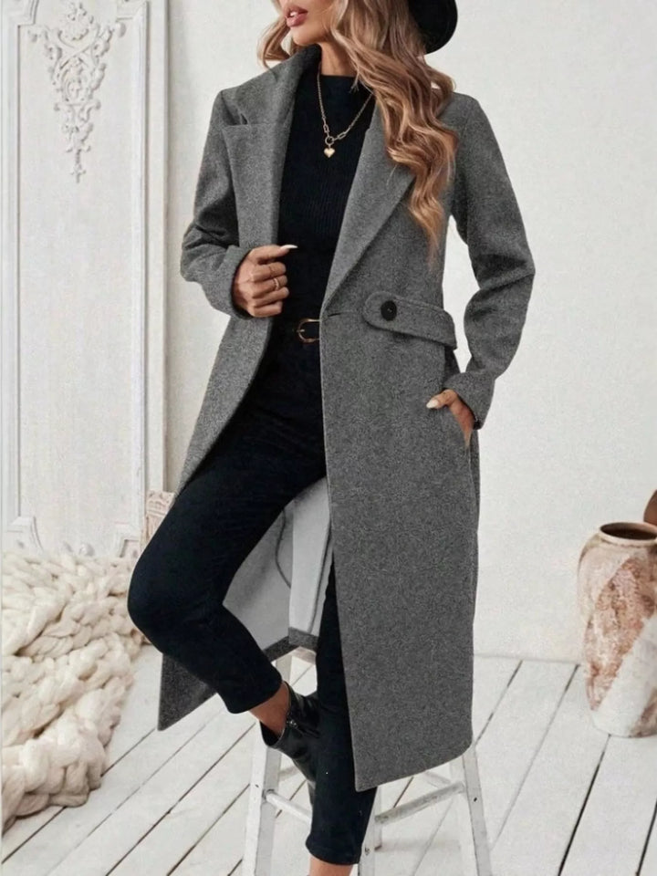 Notched lapel belted longline coat with side pockets