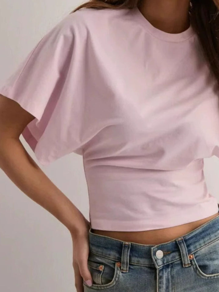 Batwing sleeve crop top with fitted waist and crew neck