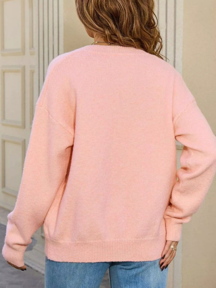 Button-down knit cardigan with front pockets and ribbed trim