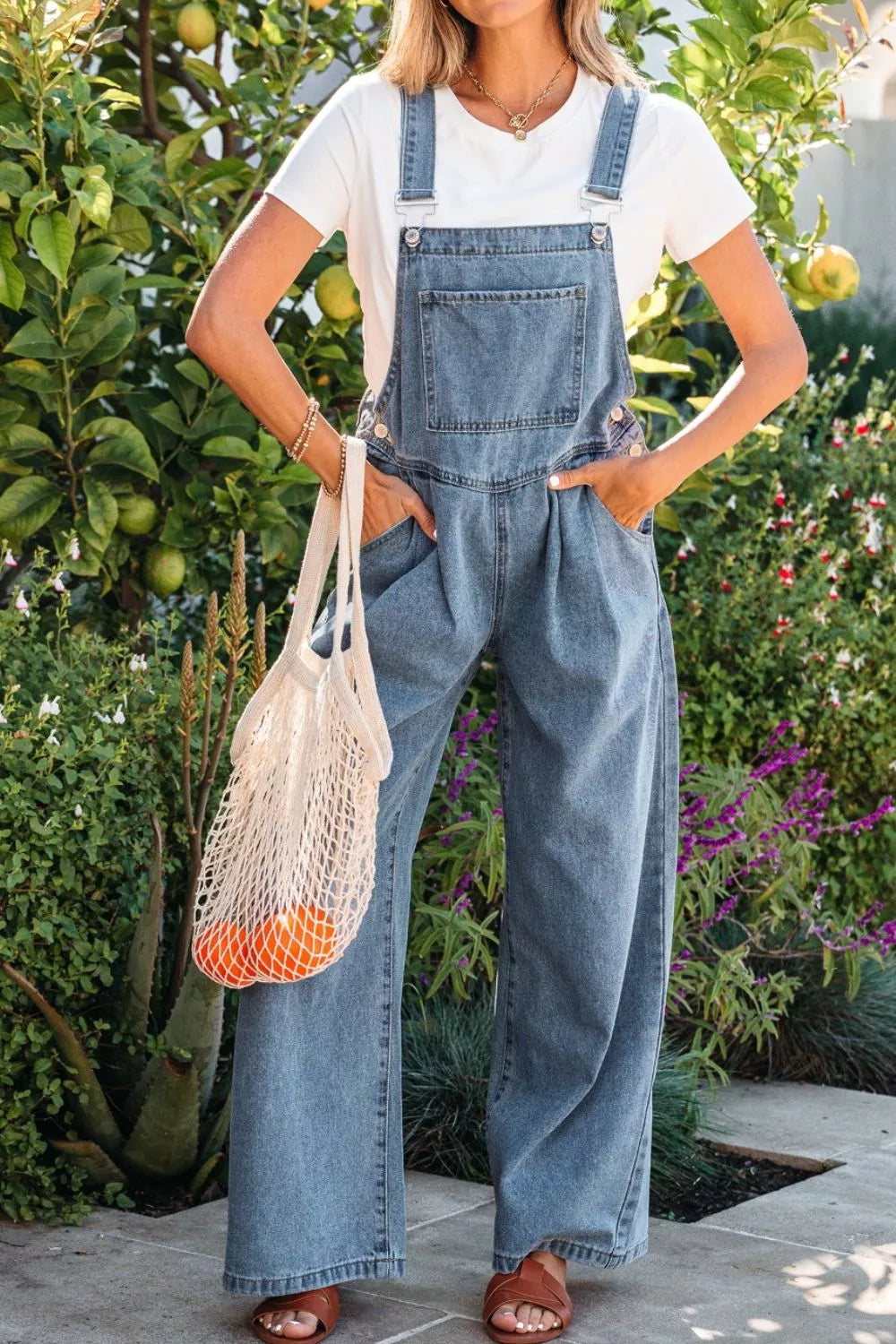 Pleated wide-leg denim overall jumpsuit with bib pocket