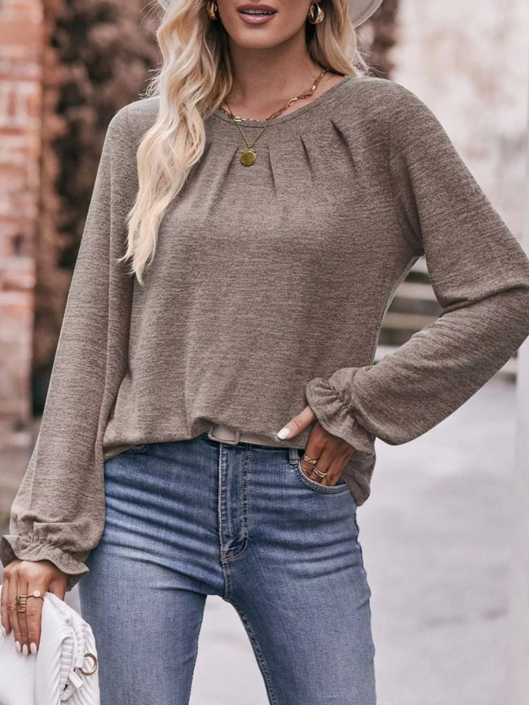 Ruffle cuff long sleeve top with pleated neckline