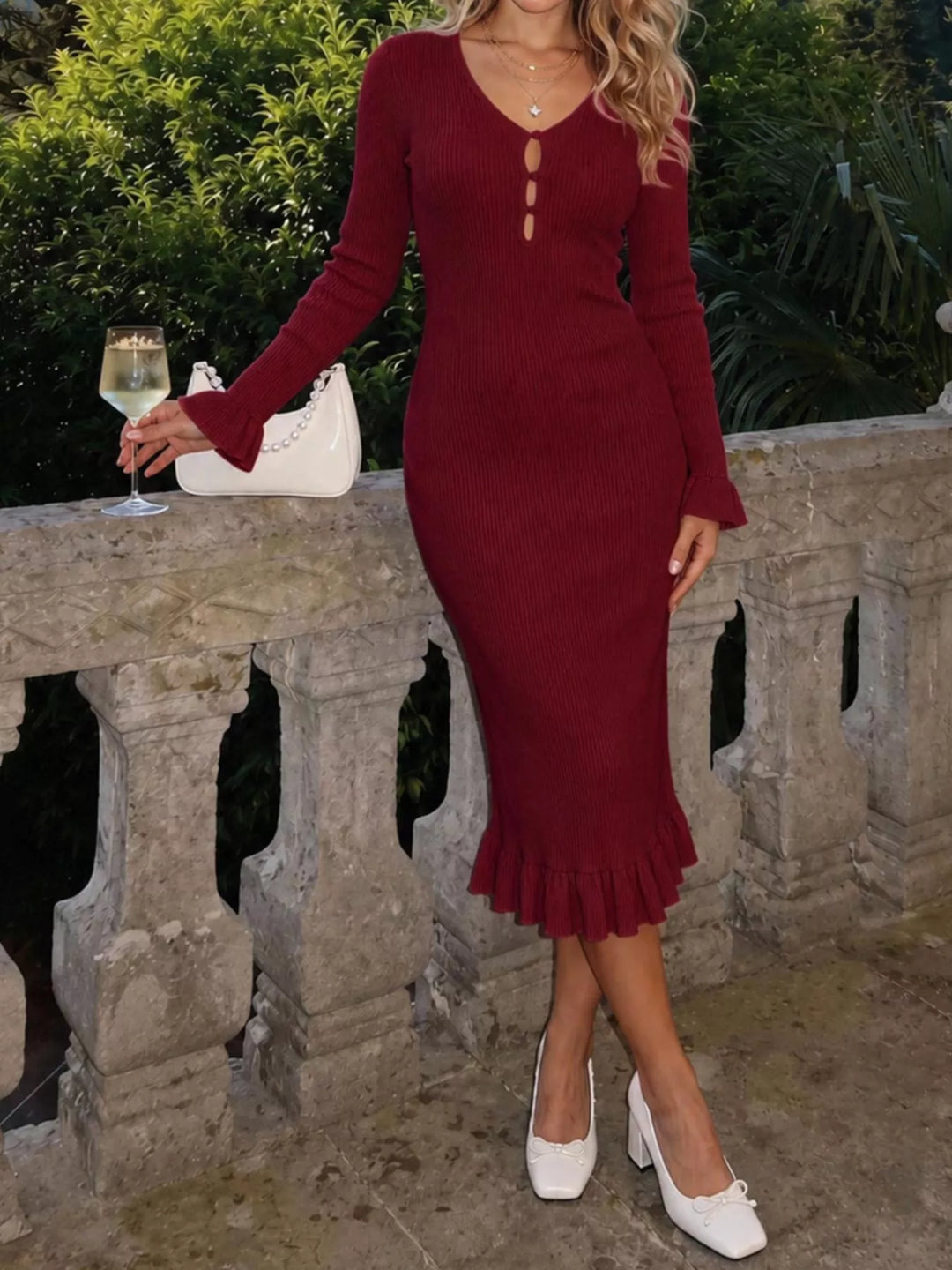 Ribbed knit midi dress with ruffle hem and button placket
