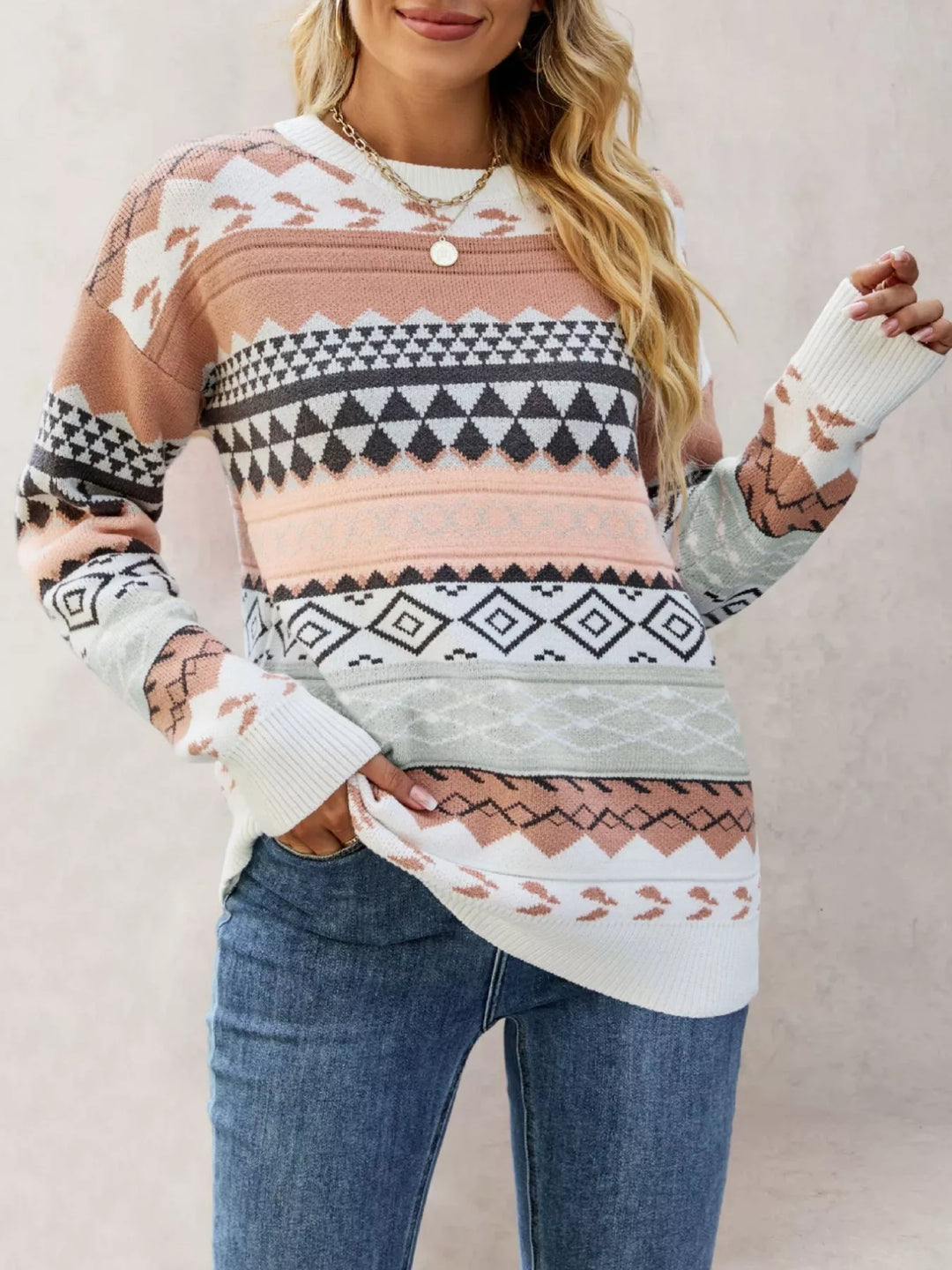 Geometric drop shoulder knit sweater with ribbed cuffs