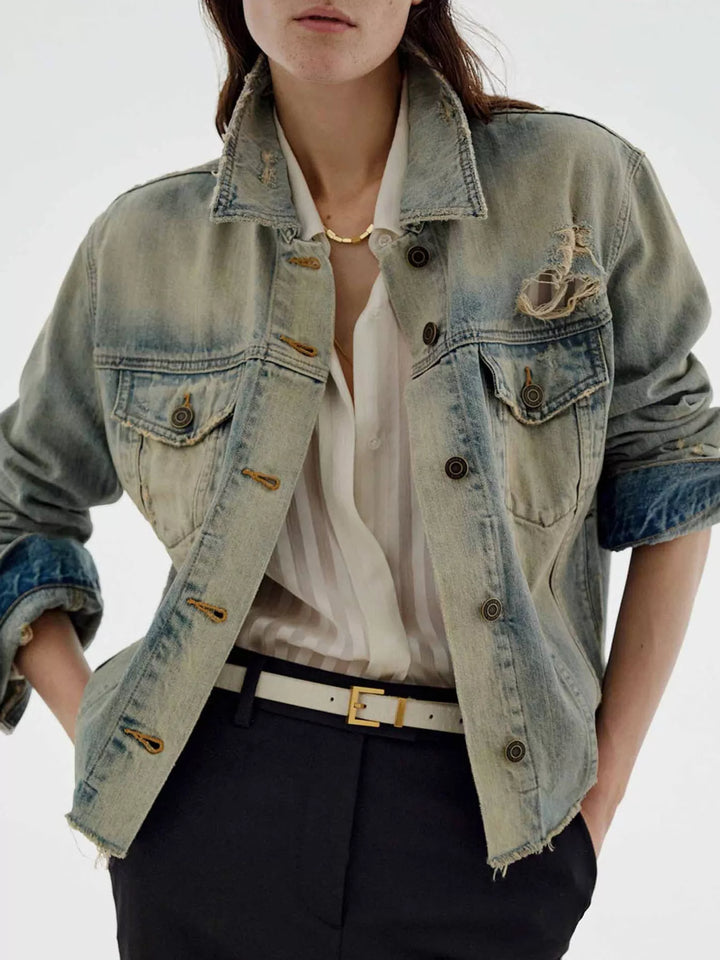 Medium Distressed vintage wash denim jacket with raw hem