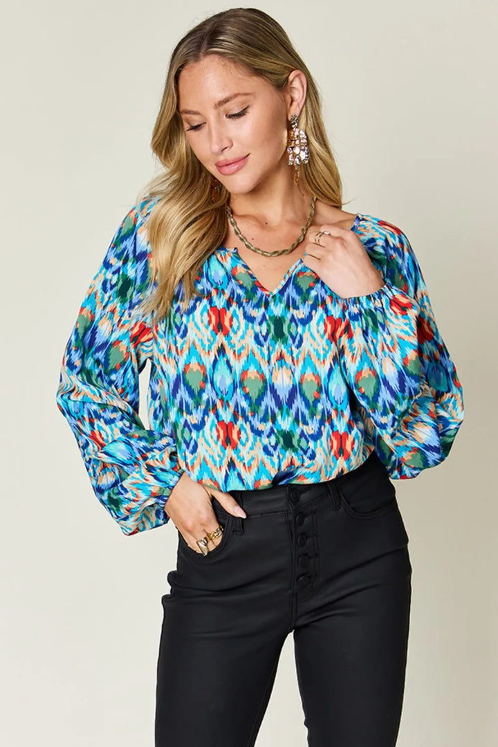 Sky Blue Abstract print balloon sleeve blouse with split neck