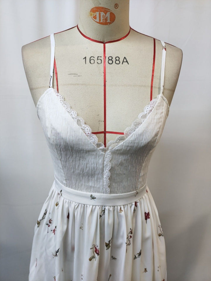 Floral cami dress with lace trim and asymmetrical hem
