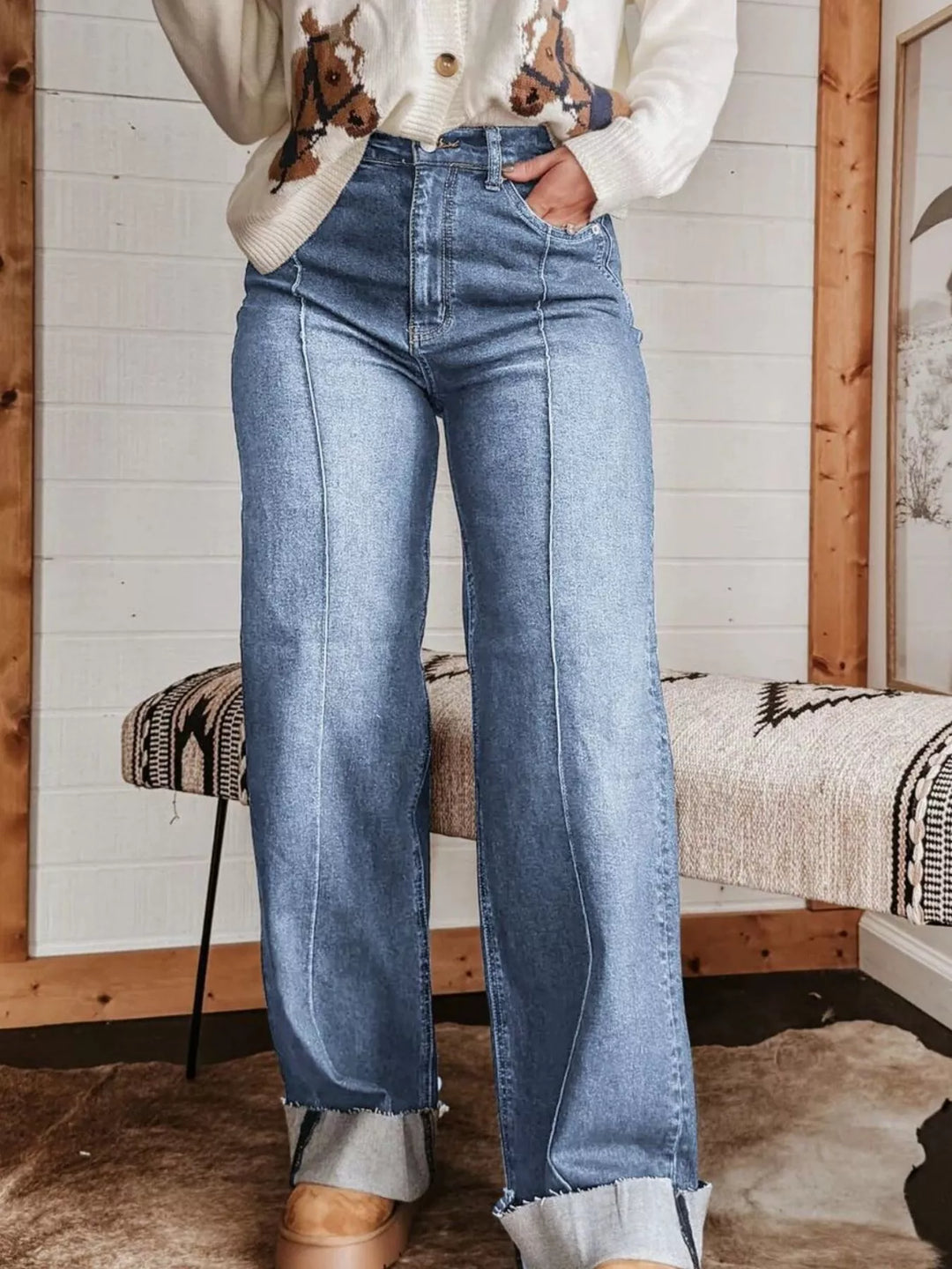 High-rise wide leg jeans with center seam and raw hem