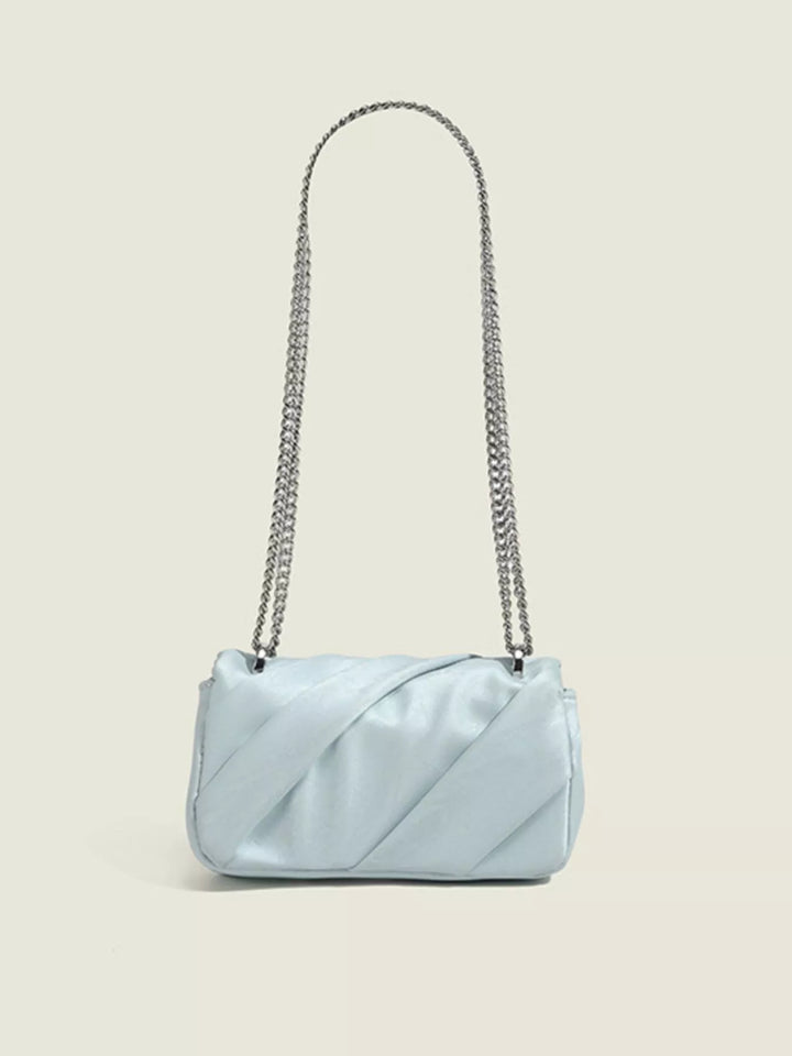 Ruched mini flap crossbody bag with silver chain strap