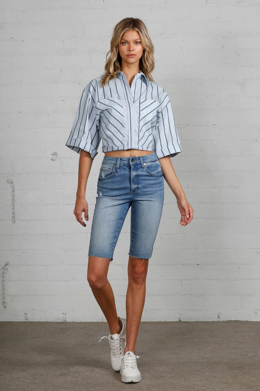 Luxe Denim High Rise Bike Shorts With Raw Hem in DARK - oversized, cropped - front view