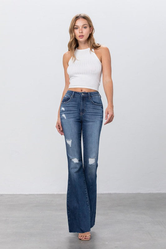 Novara Mid Rise Distressed Flare Jeans in DARK - maxi, lace - front view
