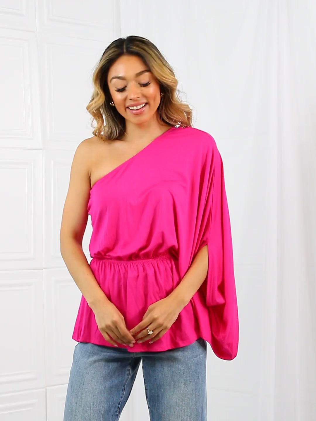 One-shoulder top with dolman sleeve and cinched waist