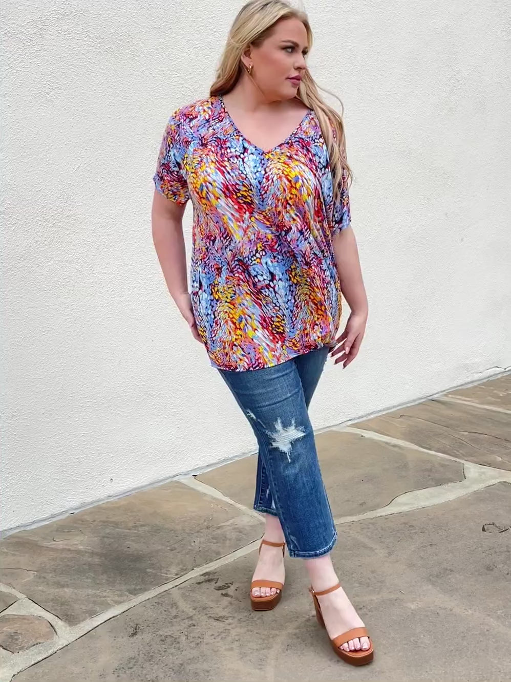 Abstract print dolman sleeve flowy V-neck top