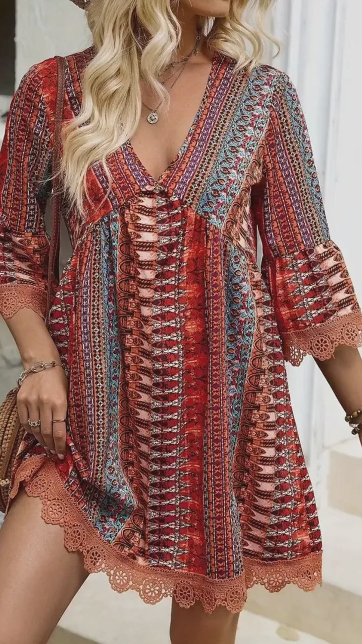 Boho printed mini dress with lace trim and bell sleeves