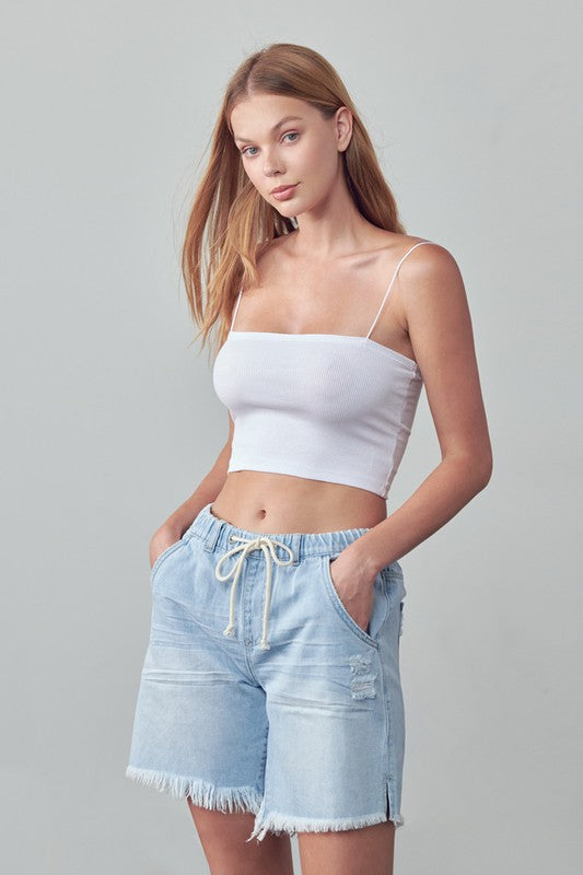 Riviera High Rise Cotton Drawstring Denim Shorts in LIGHT - denim, pockets - detail view