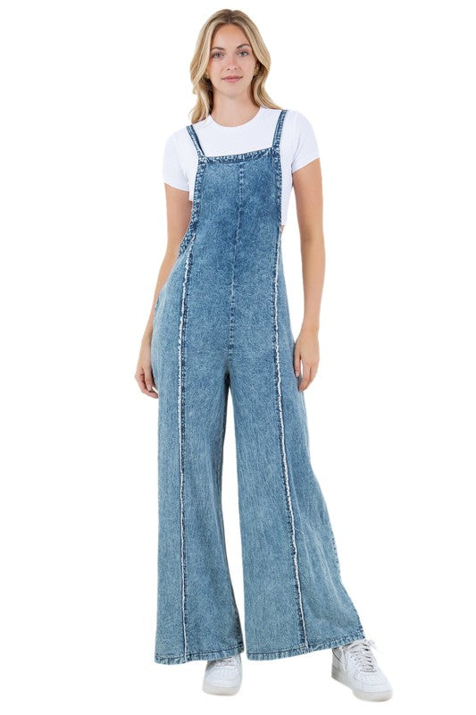 Riviera Wide-Leg Denim Jumpsuit With Adjustable Straps in BLUE - cropped, wide leg - front view