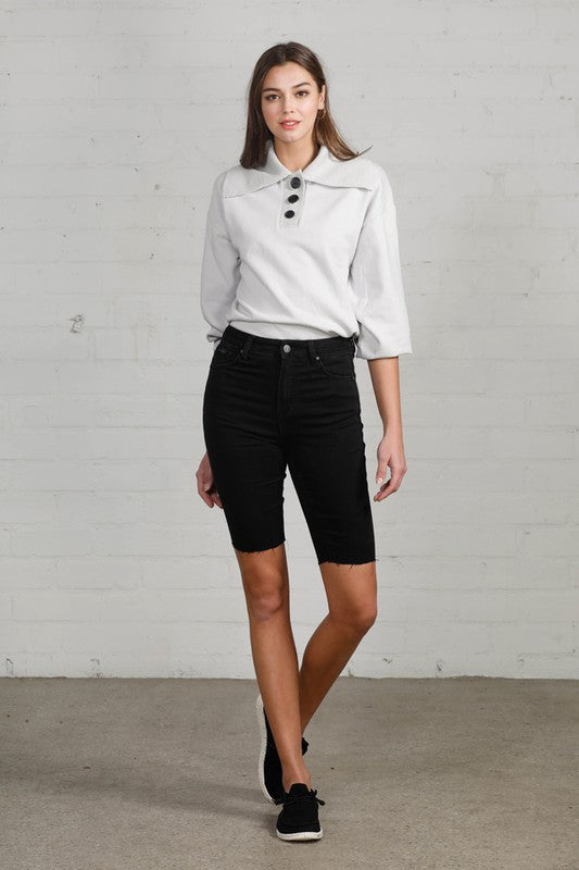 Rivington High Rise Raw Hem Biker Shorts in BLACK - oversized, denim - front view