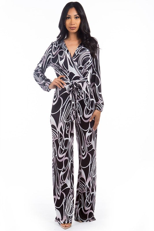 Velenza Abstract Print V-Neck Belted Jumpsuit in MULTI PRINT - v neck, cropped - front view